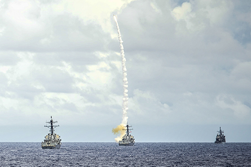 An image of a watercraft launching a missile